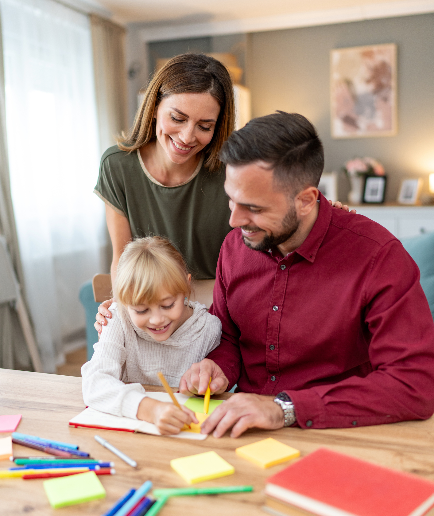 Smiling family doing art activities